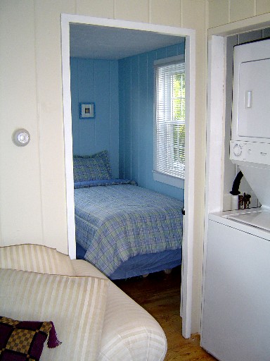 View Into Blue Bedroom From Living Room